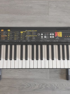 Yamaha Portable Keyboard PSR-F52 with power supply and stand