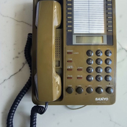 Sanyo ADX 66 phone used, vintage, brown, wired
