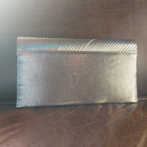 Vintage silver envelope hand bag like new with strap