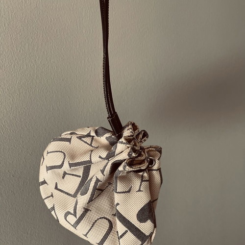Furla pouch bag like new, monogram fabric and leather