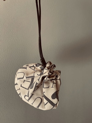 Furla pouch bag like new, monogram fabric and leather