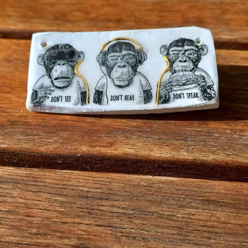 Handmade ceramic pin 6x2.5cm new, black and gold