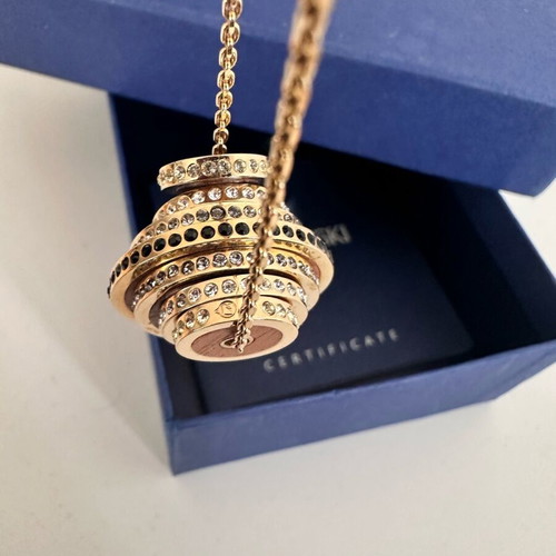 Swarovski Further necklace like new, gold tone with black and clear crystals