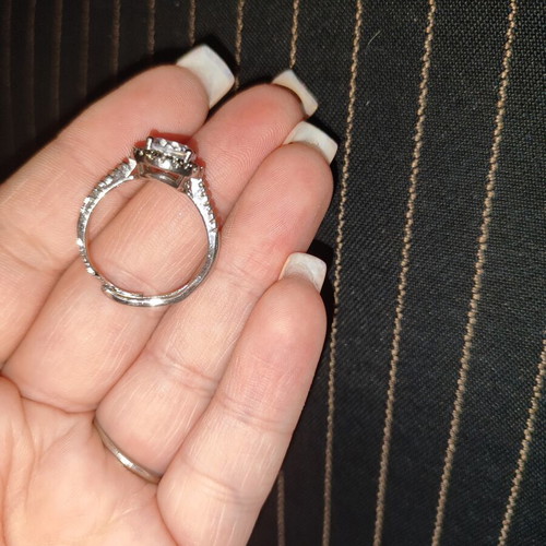 Rings set like new, silver, includes solitaire and two-stone ring size 18.5
