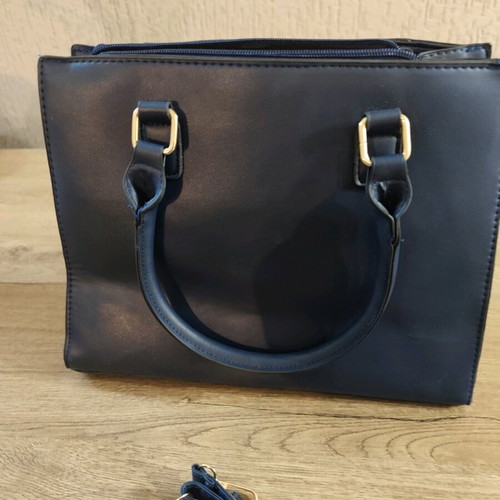 Color-block blue/white handbag used with animal print and detachable strap