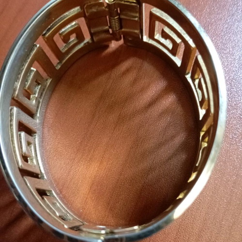 Bracelet like new, unknown material, gold color