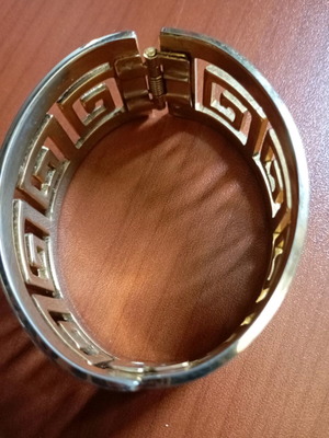 Bracelet like new, unknown material, gold color