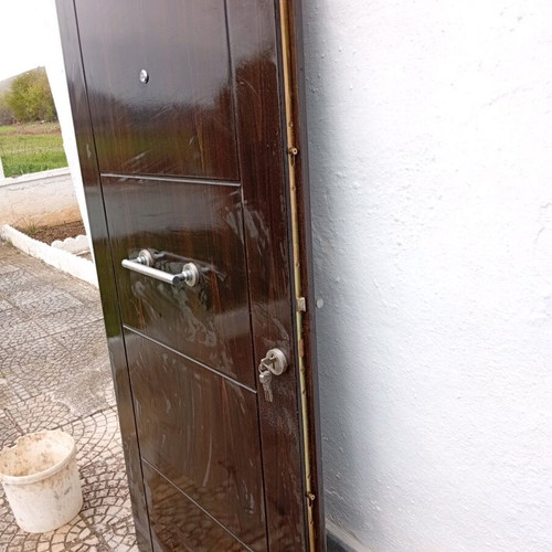 Entrance door used 2.15x0.94 solid wood with security lock