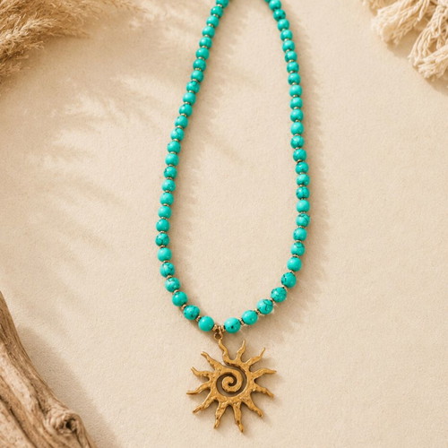 Bohemia handmade necklace with turquoise beads and gold sun pendant like new