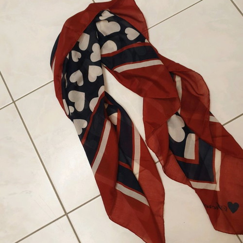 Scarf used with blue and red hearts