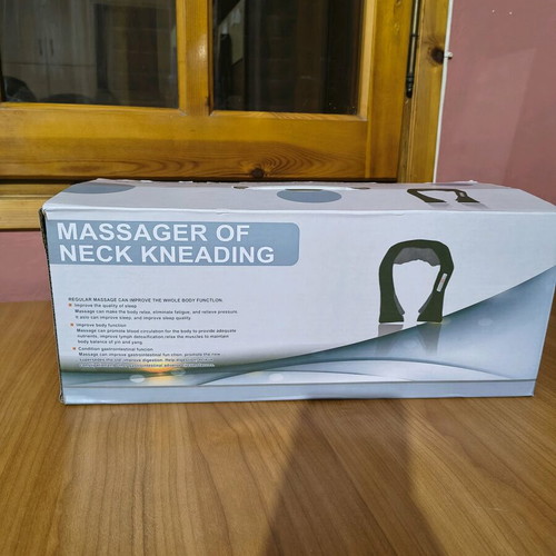 Neck massage device new in excellent condition