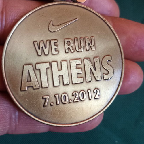 Nike We Run Athens 10K 2012 commemorative medal mint condition