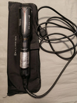 Bellissima hair straightener like new with titanium ceramic plates