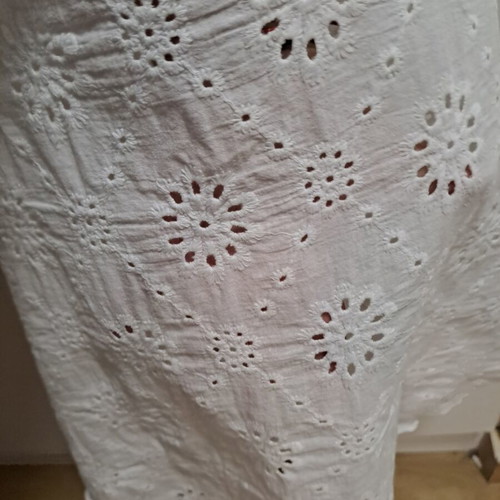 Sleeveless white top