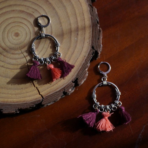 Handmade hanging earrings new with pink and purple tassels