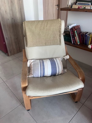 IKEA armchair used with beige leatherette cushion