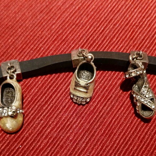 Rubber bracelet with charms like new