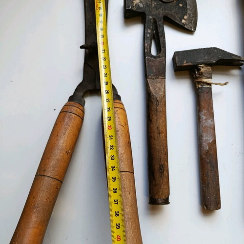 Set of old handmade tools used with wooden handles