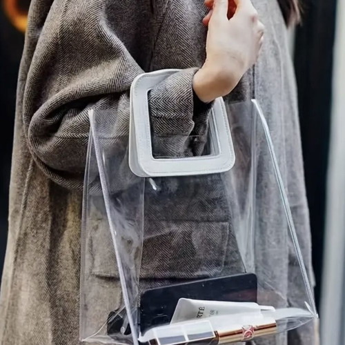 Transparent women handbag like new with white handle