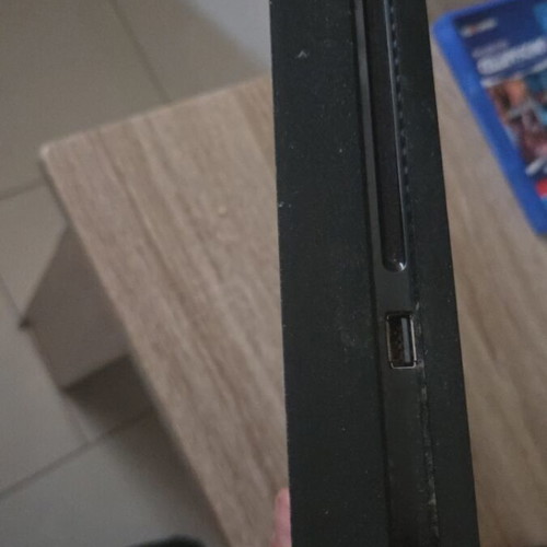 PlayStation 4 (PS4) console used with CD