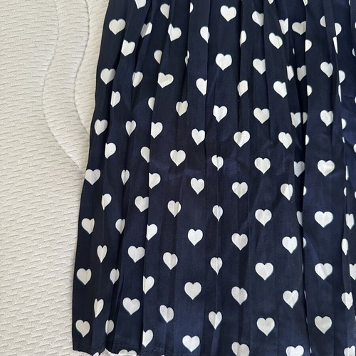 Stradivarius mini skirt with hearts, size S