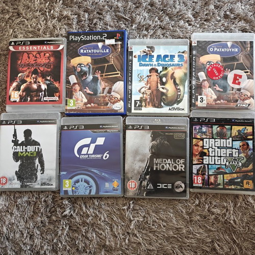PlayStation 3 used with 3 controllers and 8 popular games