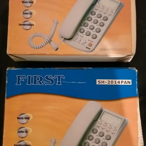 Wired phones new, white and black color, set of 2
