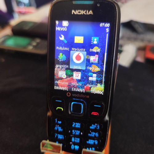 Nokia 6303 Classic phone used, black, with charger