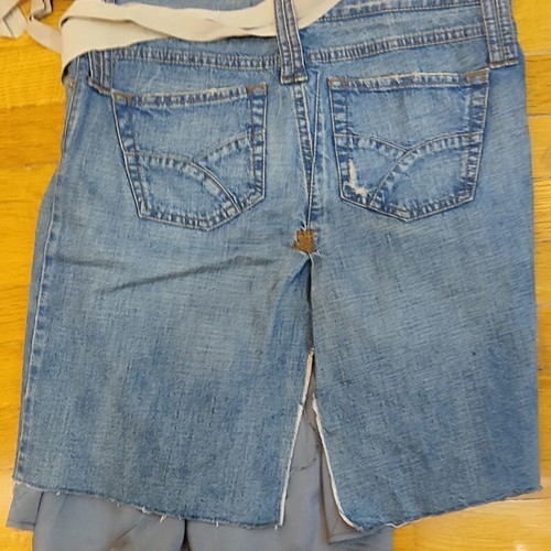Skirt combining denim and satin fabric with floral details, like new