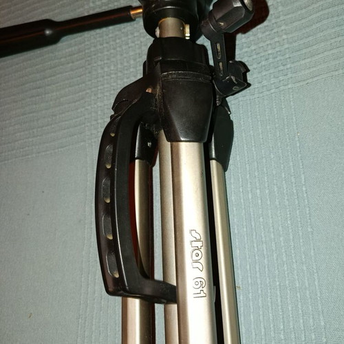 Folding photographic tripod used