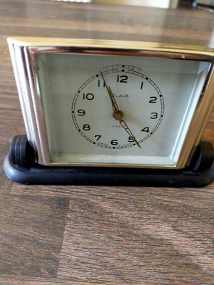 Slava mechanical table clock used, analog display