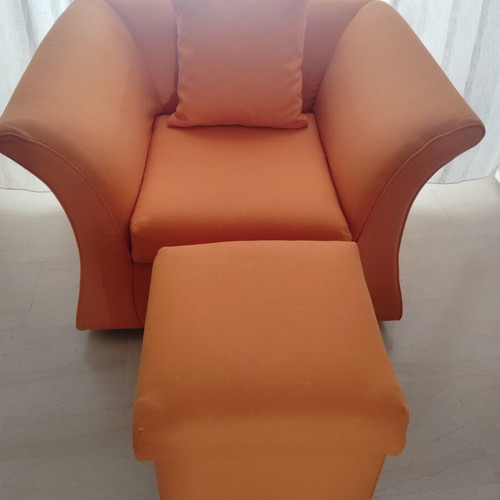 Armchair with footstool and cushion, orange