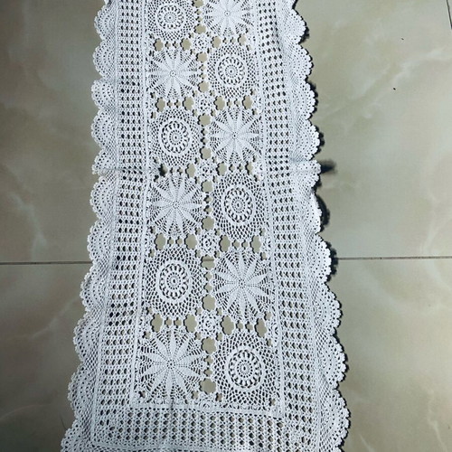 Handmade crocheted table runner used with cotton thread