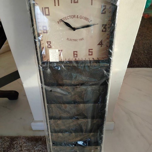 Wall clock new with 5 magazine holders
