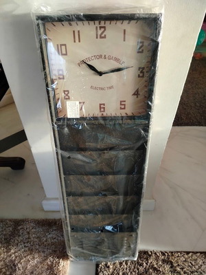 Wall clock new with 5 magazine holders