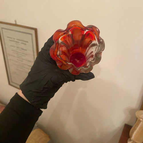 Glass vase used with thin neck in red color