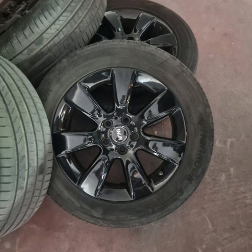 Mini 225 55 17 tires and rims like new, genuine black wheels