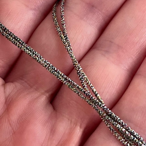 Long cord necklace adjustable, like new, metallic gold color
