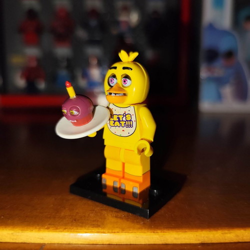 Chica The Chicken figure like new with base and Mr. Cupcake