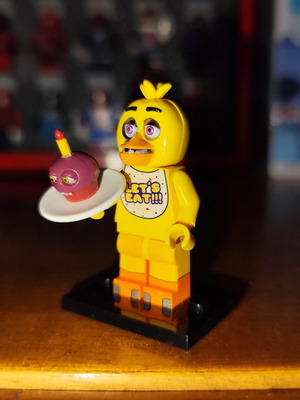 Chica The Chicken figure like new with base and Mr. Cupcake