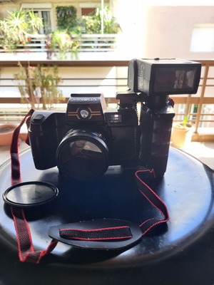 Minolta camera used with detachable flash made in Japan