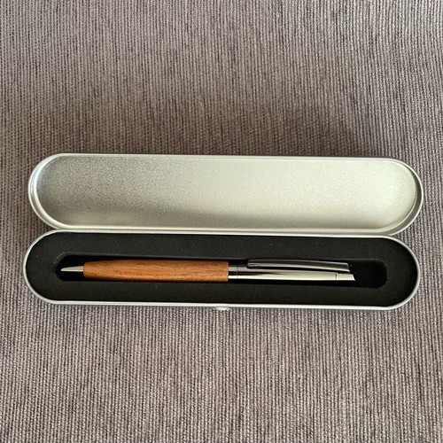 Pen new with black ink and spare blue ink refill