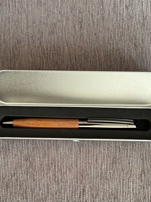 Pen new with black ink and spare blue ink refill
