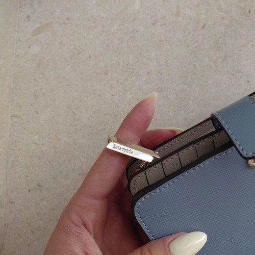 Kate Spade wallet new, turquoise with multiple card slots