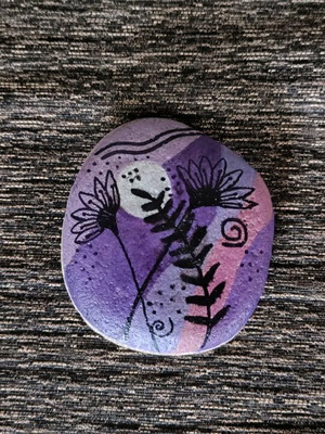 Painted stone new with acrylic colors and glossy varnish