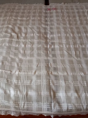 Woven silk tablecloth with embroidered monogram used