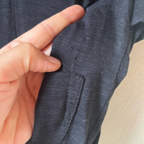 Small cotton salopette used with pockets
