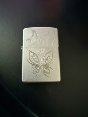 Zippo lighter used with laser engraved design