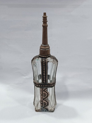 Moroccan glass perfume spray bottle with metal overlay like new
