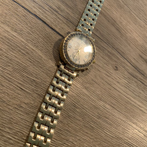 Golden wristwatch, women's